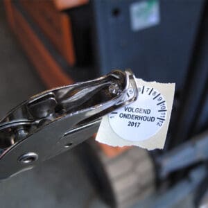 Stamping a control sticker with the Hole Punch Plier NCT-1 with a round hole